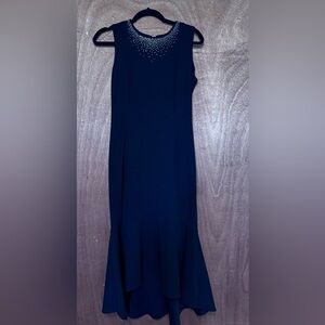 Calvin Klein Sleeveless Black Mermaid Hem Dress with Embellished Neckline.